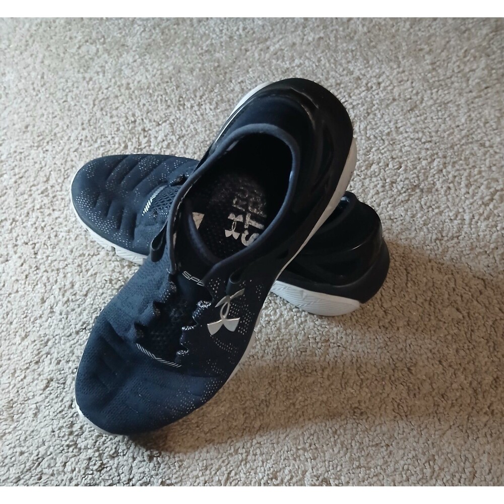 Black and silver Under Armour Shoes